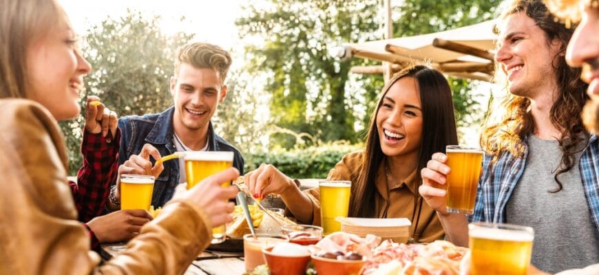 Group,Of,Multi,Ethnic,Friends,Having,Backyard,Dinner,Party,Together